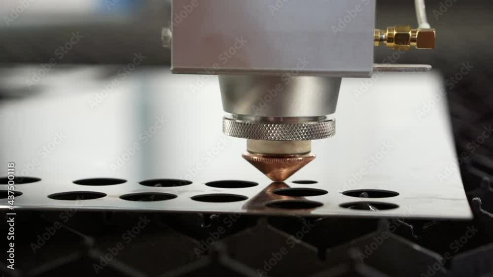 Plasma laser cutting of sheet metal.