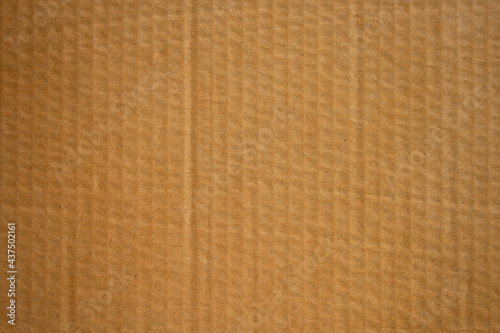Brown cardboard paper box texture background.