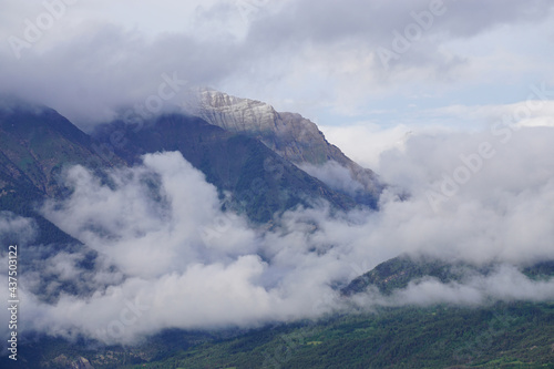 clouds over the mountains  in Serre Ponçon, France © poupine
