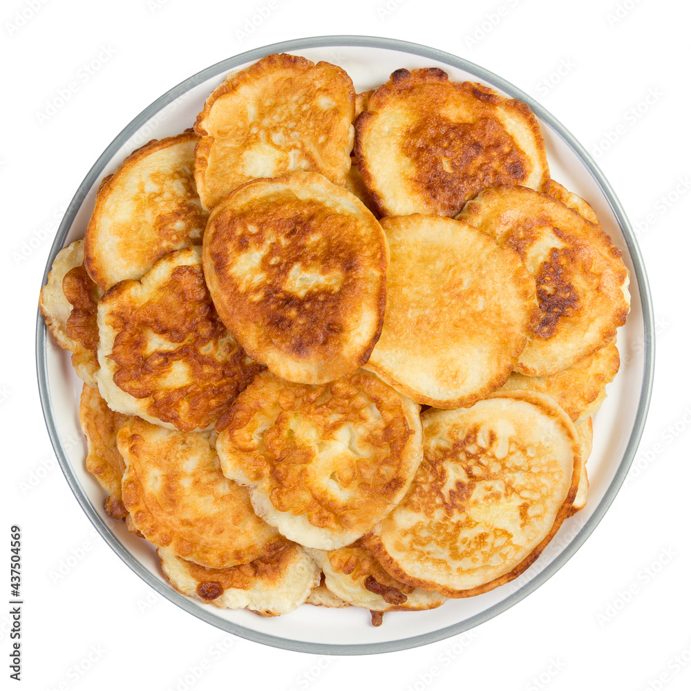 Homemade pancakes on a plate isolated on white background Homemade pancakes on a plate isolated on white background