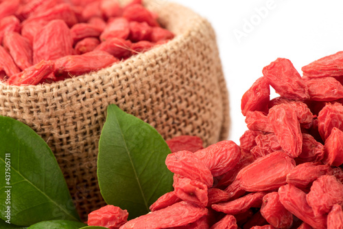 Dried goji berry fruits isolated on white background. photo