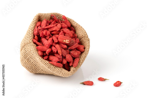 Dried goji berry fruits isolated on white background. photo