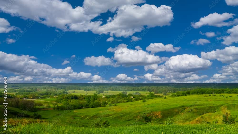 small village in green mountain valley time lapse scene small village in green mountain valley time lapse scene