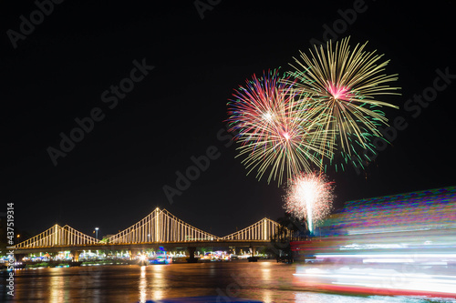 SURATTHANI, THAILAND - OCTOBER 17 : Beautiful firework display for celebration on the Tapee river on parades in Chak Phra Festival on October 17, 2015 in Suratthani, Thailand.
