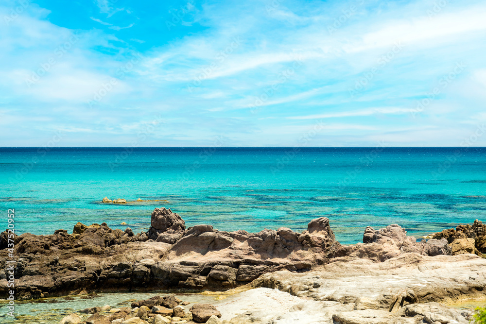 (Selective focus) Stunning view of a coastline bathed by a turquoise, clear sea. Rena Majore is a small seaside village that's located south of Santa Teresa Gallura, Sardinia, Italy.