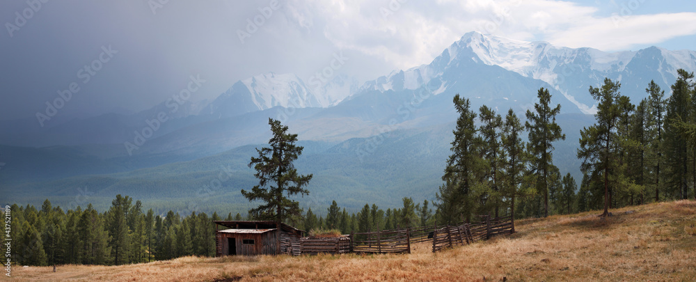Farm in the mountains of Altai, old house in the mountains, panoramic