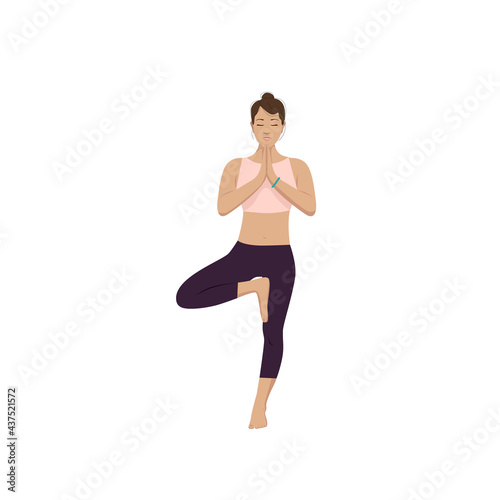 A young girl stands on one leg in a yoga balance pose. Sports and health promotion © Ольга Копылова