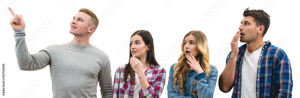 The four surprised people stand on the white background The four surprised people stand on the white background