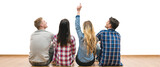 The four friends sit on the floor and gesture on a white wall background