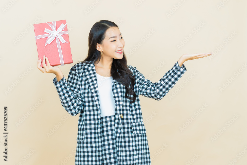 Portrait beautiful young asian woman smile with red gift box Portrait beautiful young asian woman smile with red gift box