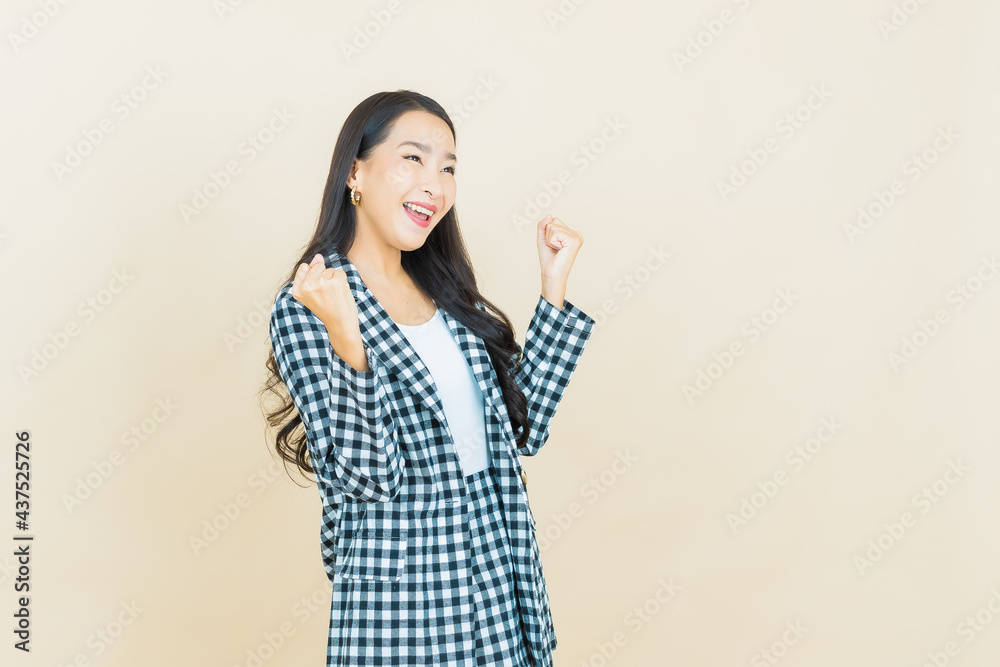 Portrait beautiful young asian woman smile with action Portrait beautiful young asian woman smile with action