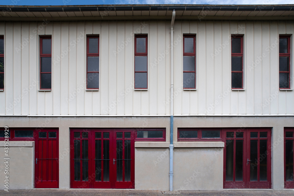 Architecture of an old industrial building in white and red