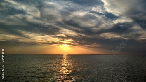  sunset and fluffy clouds