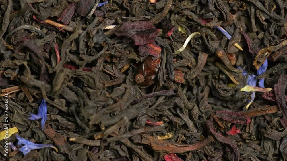 Macro video: Tea ingridients rotating Macro video: Tea ingridients rotating