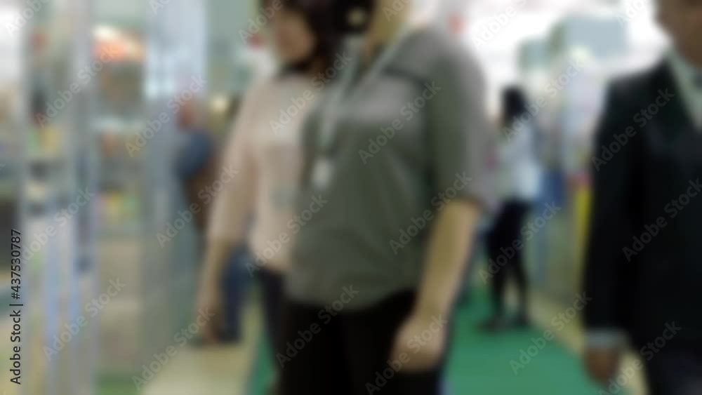 Blurred defocused video with people. Blurred defocused video with people.