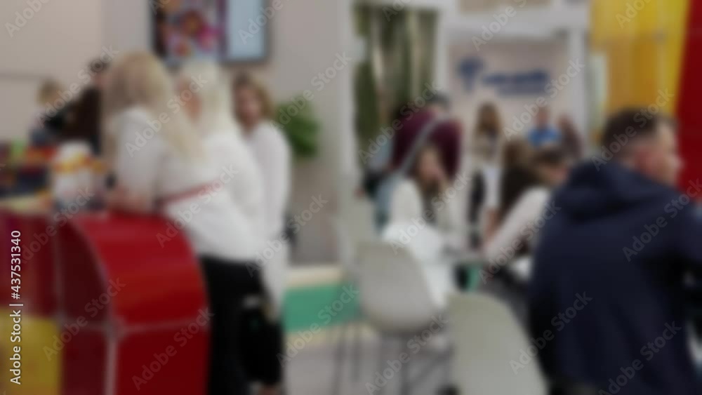 Blurred defocused video with people. Blurred defocused video with people.