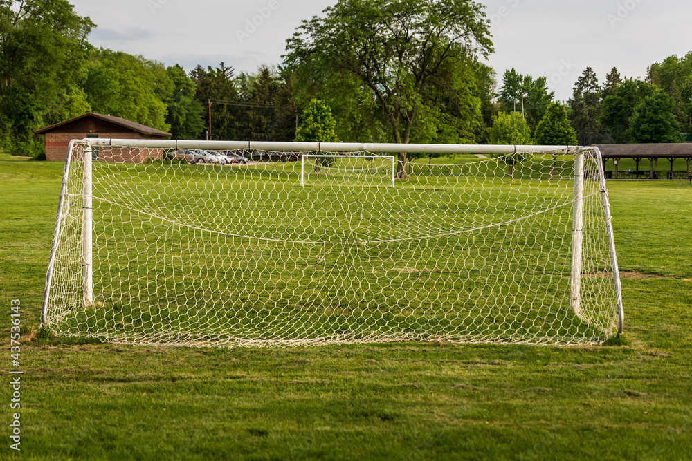 Fototapeta premium view of a youth soccer field in a city park