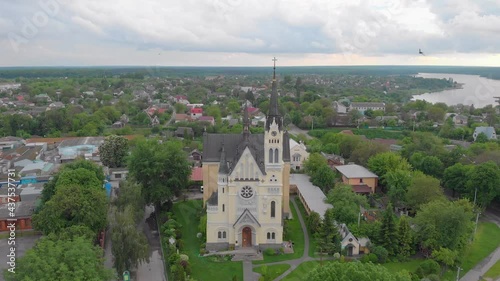 Swallows over the church Exaltation of the Holy Cross church Fastiv Ukraine aerial drone view photo