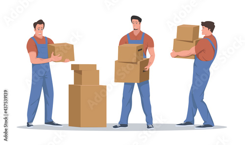 Movers with cardboard boxes in yellow t-shirts and blue overalls stand full-length and smile.