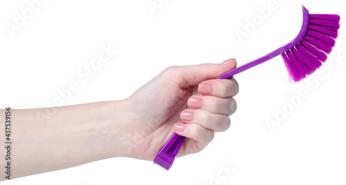 Washing cleaning plastic brush in hand on white background isolation