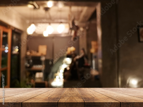 3D rendering, wooden top table on isolate blur and bokeh background © Chatya
