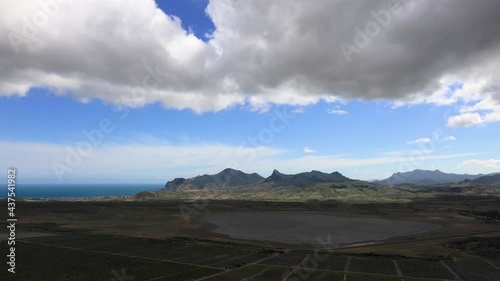 Dramatic movement of clouds over Karadag volcano, Koktebel village, dry salt lake Barakol and vineyards. Black Sea, Crimea. Time-lapse.