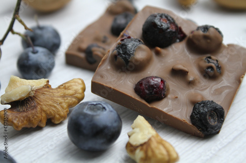 Hand made chocolate with freeze-dried blueberry and walnut