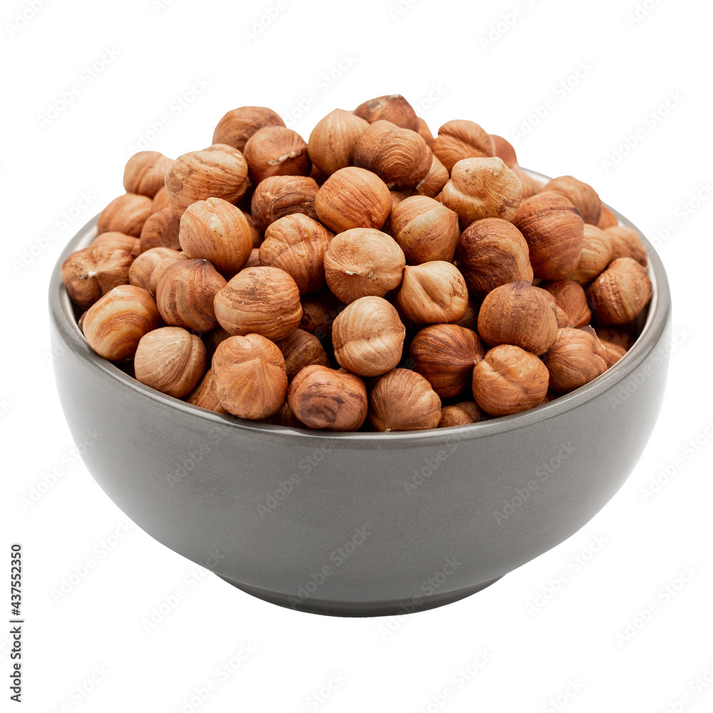 Peeled hazelnuts in a bowl, isolated on white, angled view. Template for designers Peeled hazelnuts in a bowl, isolated on white, angled view. Template for designers