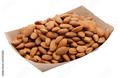 Peeled almonds in a craft box isolated on white, angled view. Template for designers