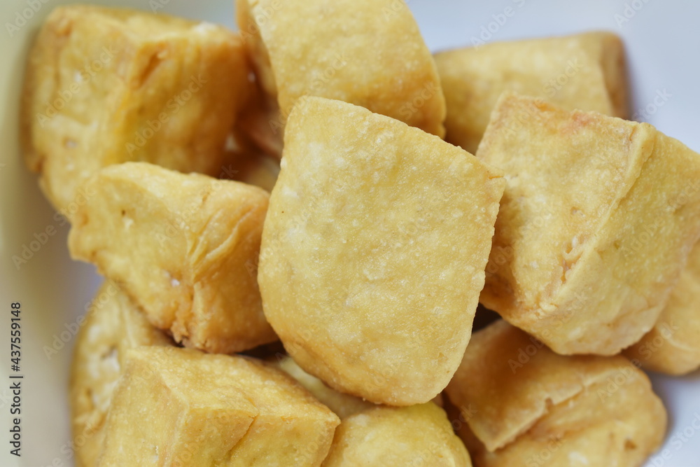 deep fried tofu dipping with sweet crushed bean sauce on plate deep fried tofu dipping with sweet crushed bean sauce on plate