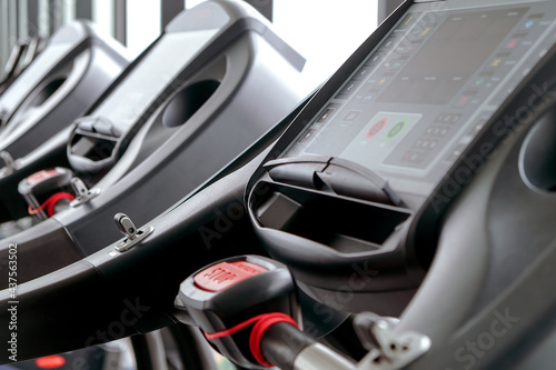 Detail image of Treadmill in fitness room background  © ponsulak
