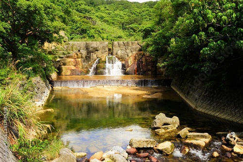 Waterfall and creek at Yambaru National Park in Okinawa, Japan - 日本 沖縄 やんばる国立公園 川と滝 photo