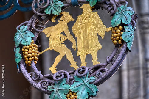 Ornate ironwork at the entrance of the Mädlerpassage in Leipzig with a Scene from Johann Wolfgang von Goethe's tragedy 