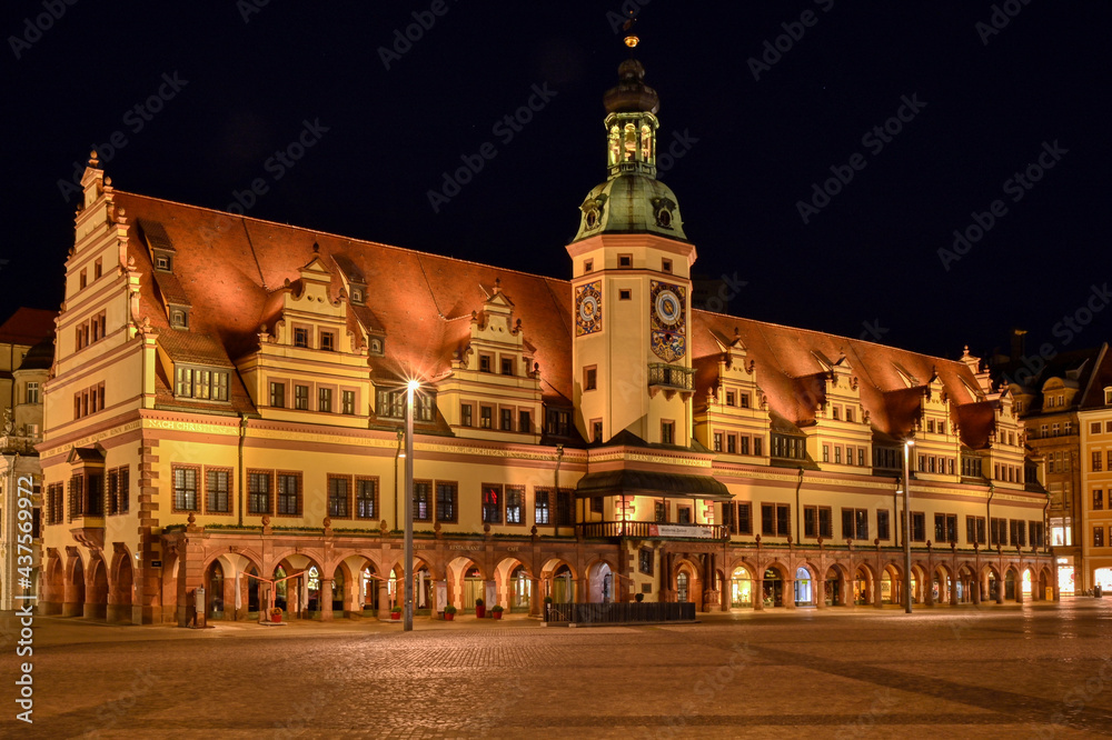 Illuminated old town hall and market square in Leipzig at night