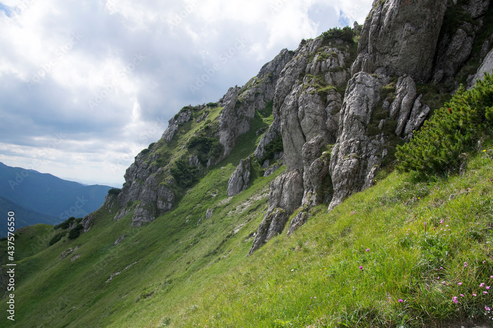 Ridgeway and amazing green wide views in Mala Fatra mountains in Slovakia, summer season sceneries and beautiful rocks
