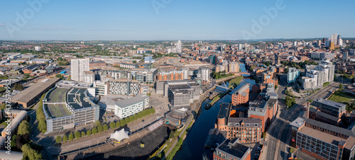 Tableau sur toile Aerial view of Leeds city centre on a sunny day looking west from near the docks  towards the Armouries, Bridgewater Place and Crown Point