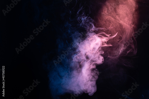 Blue and pink steam on a black background.