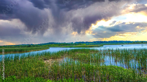 stormy sunset sky in Alabama swamp landscape in summer