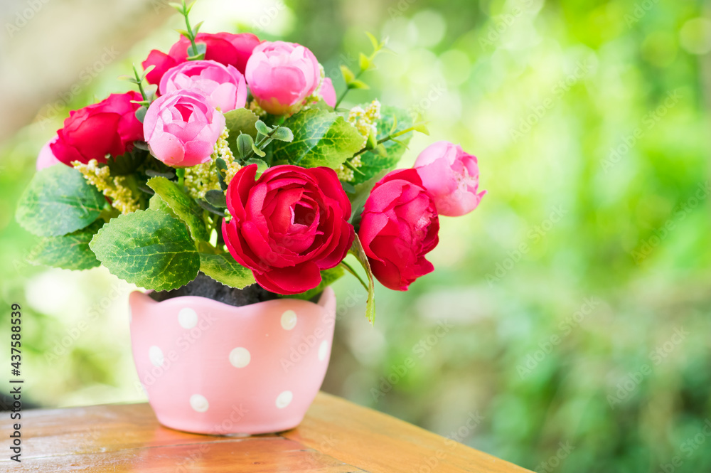 Artificial rose flowers in vase. Artificial rose flowers in vase.