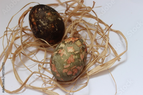Amazing color eggs in Easter. Nest with eggs. Easter symbol.