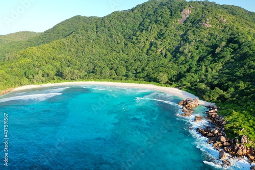 Scenic view of beautiful tropical beach and landscape. Nature background. La Digue island, Seychelles © VitalyRomanovich