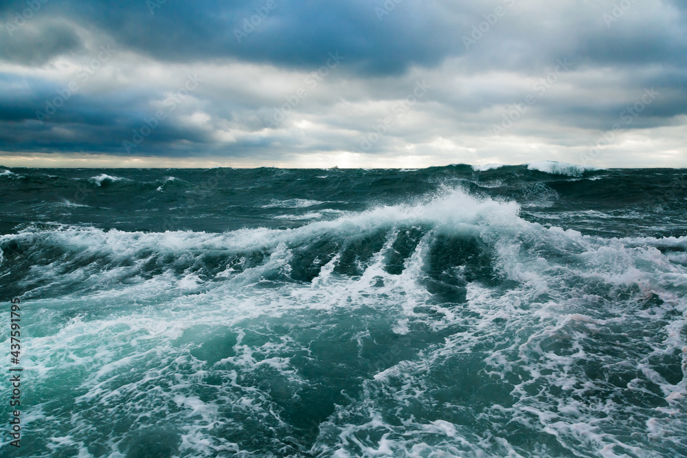 Ocean storm. Storm waves in the open ocean. Not a calm open sea. Ocean storm. Storm waves in the open ocean. Not a calm open sea.