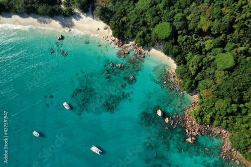 Aerial view of a luxury yacht vacation. Nature background. Praslin island, Seychelles