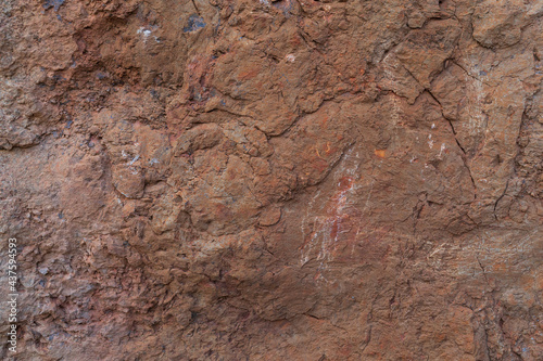 Brick red stone texture closeup background