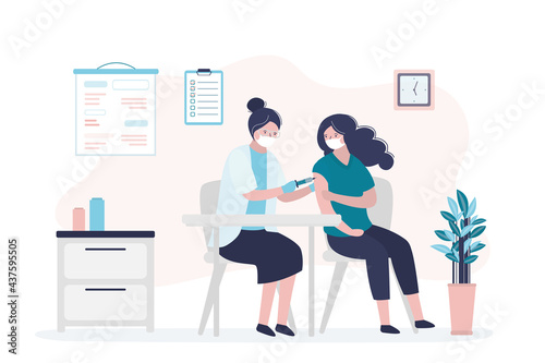 Nurse giving coronavirus vaccine to patient. Doctor makes injection of medication. Cute woman vaccinated against coronavirus
