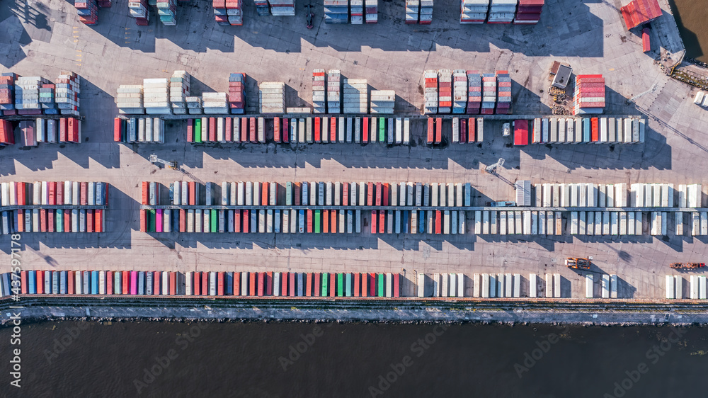 Top aerial view on cargo containers on the container site