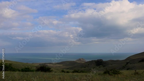 Beautiful view of Cape Chameleon and Koktebel Bay. Black Sea, Crimea. Timelapse, 4k