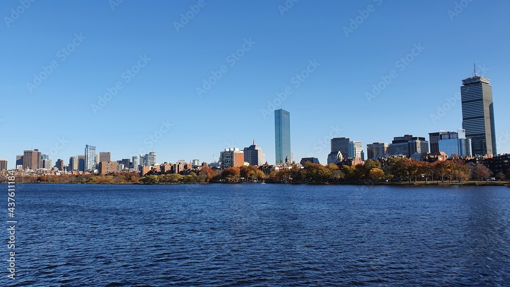 Boston city Skyline in autumn, skyscrapers and sea, clear sky