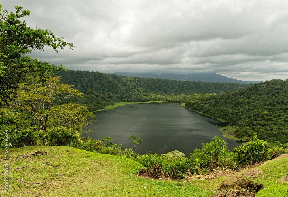 Costa Rica - Laguna Hule, volcano crater with the water lake and green rainforest, near Arenal volcano, Alajuela, Rio Cuarto, landscape view and travel point