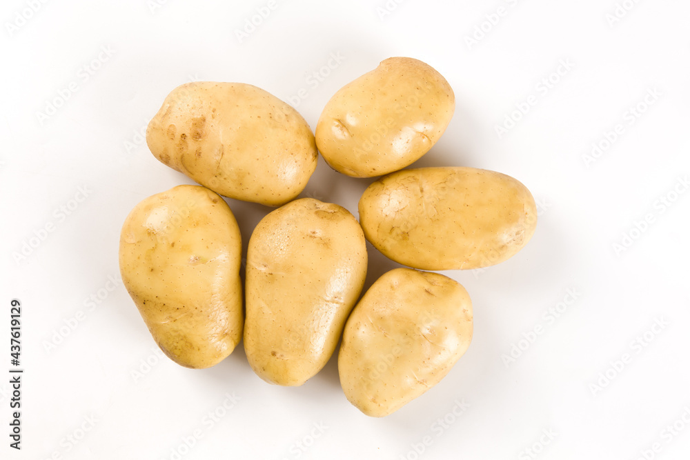 Raw potatoes isolated on white background Raw potatoes isolated on white background